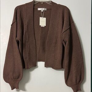 Women’s bolero style sweater. Long sleeves, no buttons. Medium brown.